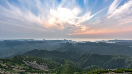 Serene Mountain Landscape Under a Dreamy Sky wallpaper
