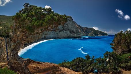 Serene Coastal Vista Above Pristine Waters wallpaper
