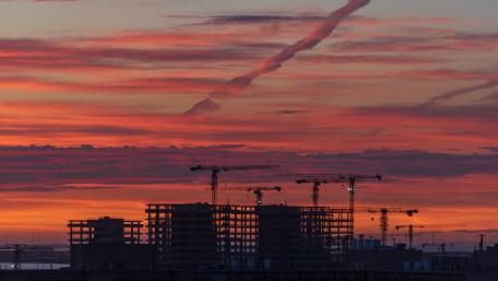 Morning Glow Over Urban Skyline wallpaper