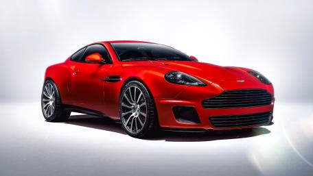 Sleek Aston Martin Vanquish in Radiant Red Shine wallpaper