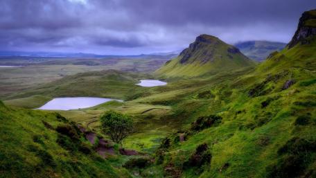 Breathtaking Green Hills and Tranquil Lakes Scene 4K Wallpaper wallpaper