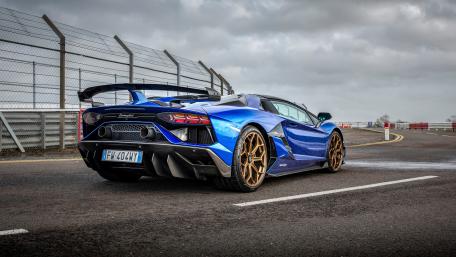 Sleek Blue Lamborghini Aventador SVJ Wallpaper wallpaper