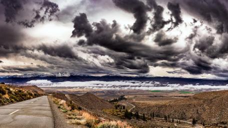 Majestic Road Under a Dramatic Sky wallpaper