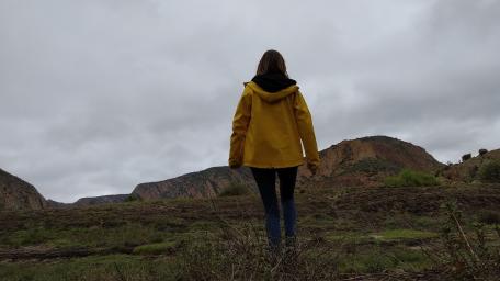 Exploring Nature’s Serenity in Yellow Raincoat wallpaper