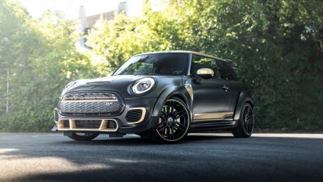 Sleek MINI Cooper GP in Natural Surroundings wallpaper