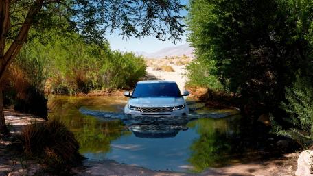 Adventure Awaits with Range Rover Evoque in Nature's Embrace wallpaper