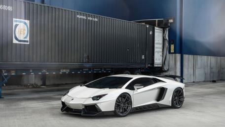 Sleek Lamborghini Aventador in Urban Setting wallpaper