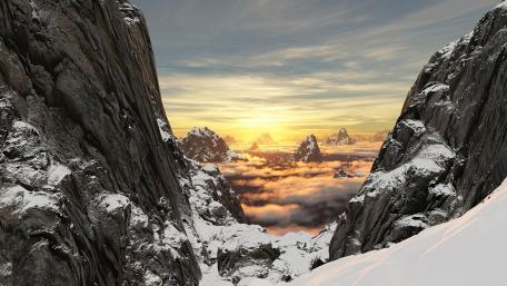 Majestic Snowy Peaks Under a Golden Sky wallpaper