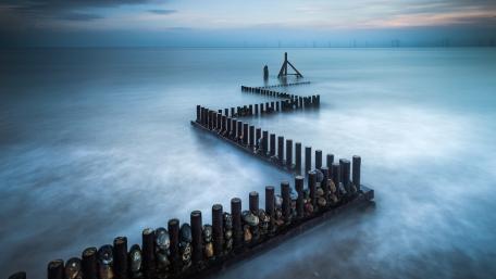 Tranquil Horizon by the Breakwater wallpaper