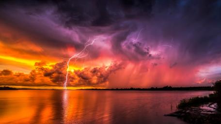 Stormy Lake Under Striking Lightning Effects wallpaper