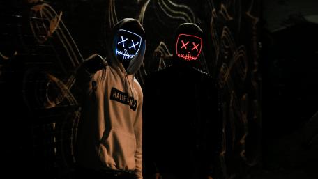 Mysterious Friends in Neon Masks wallpaper