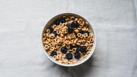 Delicious Breakfast Bowl of Cereal and Blueberries wallpaper