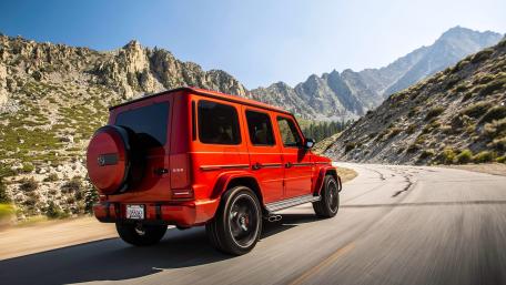 Iconic Mercedes-Benz G-Class on a Scenic Mountain Road wallpaper