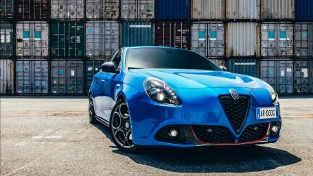 Sleek Alfa Romeo Giulietta in Vibrant Blue Clarity wallpaper