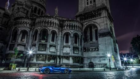 Sleek Ford GT under a Moonlit Sky wallpaper