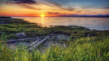Serene Sunset Over Tranquil Lake Landscape wallpaper