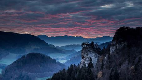 Serene Valley Under an Overcast Sky wallpaper