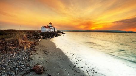 Waves and Sunset Embrace the Lighthouse wallpaper