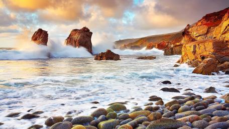 Majestic Coastal Waves and Rocky Formations wallpaper