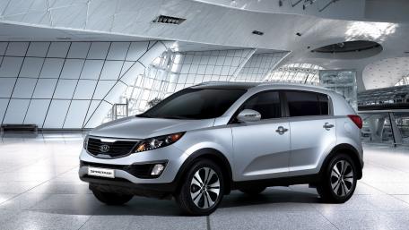Sleek SUV Design in Modern Architecture wallpaper