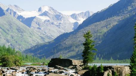 Majestic Mountain Landscape with Peaceful River Flowing wallpaper