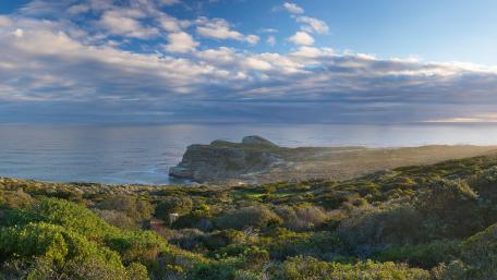 Serene Coastal Vista Under a Majestic Sky wallpaper