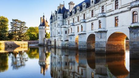 Majestic Castle Reflection in Serene Waters wallpaper