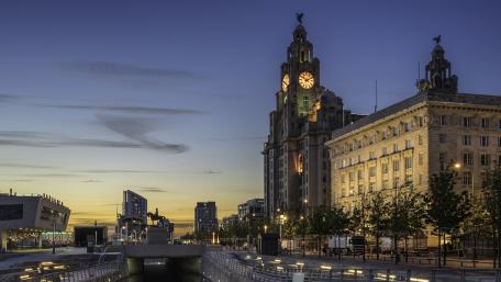 Stunning Sunset Over Iconic City Architecture wallpaper