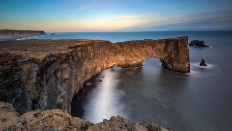 Majestic Coastal Arch at Twilight wallpaper