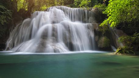 Serenity of Nature in a Waterfall Scene wallpaper