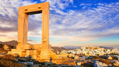 Ancient Ruins Overlooking a Picturesque Cityscape wallpaper
