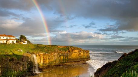 Rainbow Over Coastal Cliffscape wallpaper