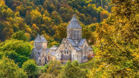 Serene Autumn Landscape with Ancient Architecture wallpaper