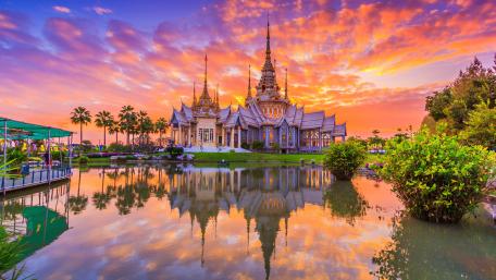 Majestic Temple at Dusk Over Serene Waters wallpaper