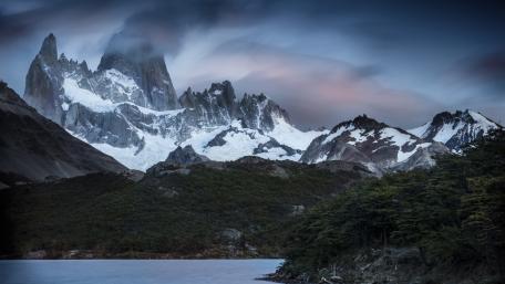 Majestic Peaks Under a Dreamy Sky wallpaper