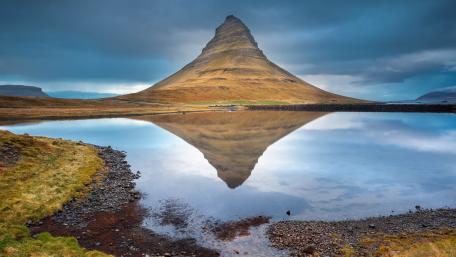 Majestic Mountain Reflected in Tranquil Waters wallpaper