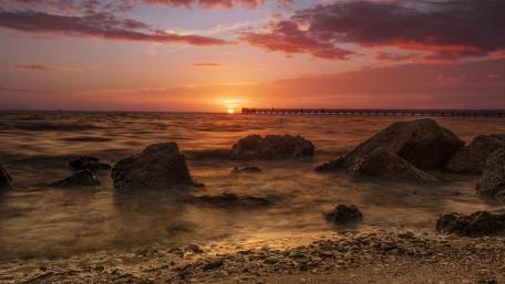Serene Sunset Over Calm Waters wallpaper