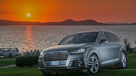 Elegant Audi SUV at Sunset by the Water wallpaper