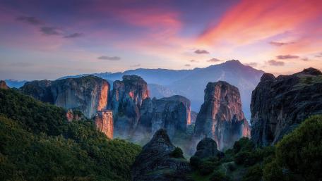 Majestic Sunset Over Meteora Cliffs wallpaper