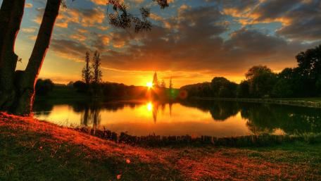 Golden Sunset at Tranquil Lake wallpaper