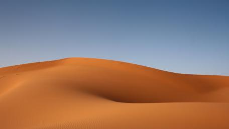 Desert Dunes at Dawn Shimmering in Solitude wallpaper