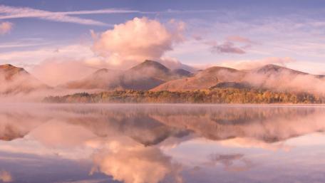 Serene Morning Reflections on a Tranquil Lake wallpaper