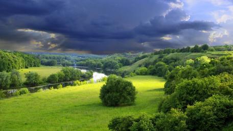 Majestic River Under a Dramatic Sky wallpaper