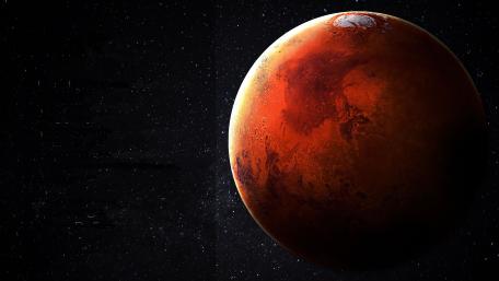 Mars' Majestic Glow in the Cosmic Dark wallpaper
