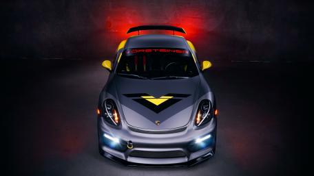 Sleek Porsche GT4 with Striking Design and Impactful Presence wallpaper
