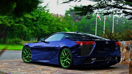 Sleek Lexus LFA with Vibrant Green Accents and Scenic Background wallpaper