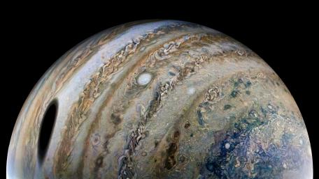 NASA-Juno Captures Moon Shadow on Jupiter wallpaper