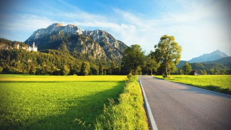Serene Journey Through Majestic Mountains and Meadows wallpaper