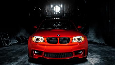 Sleek Red BMW in Dramatic Lighting wallpaper