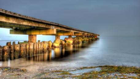 Serene Waters and Tranquil Pier Scene wallpaper